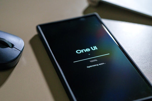 A Samsung phone performing a One UI update.