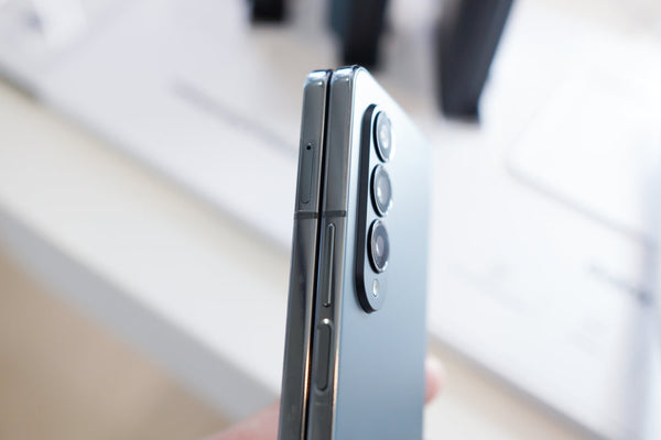 A folded grey Samsung Galaxy Z Fold phone folded.